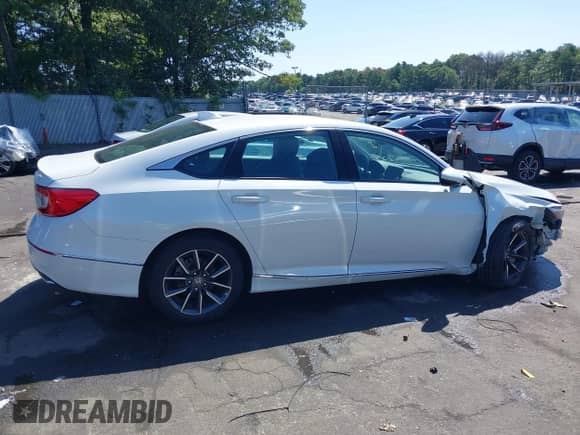 2021 Honda Accord EX-L z VIN 1HGCV1F5XMA099418, wystawiony jako IAAI lot #42881279 z przebiegiem 56 212 mil mil oraz . Historia ofert i sprzedaży dostępna na DreamBid. Obrazek 13.