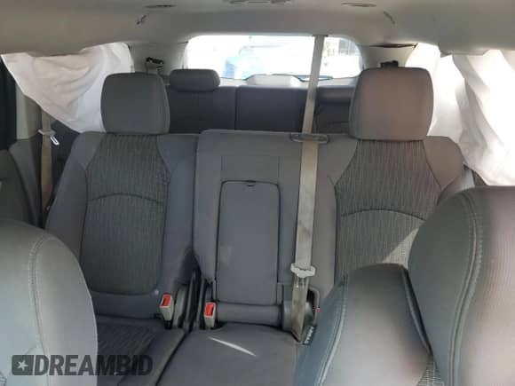 2014 Chevrolet Traverse LS с VIN 1GNKRFKD2EJ349865, выставлен на аукционе Copart как лот 67515875 с пробегом 143 968 миль миль и Списание • Salvage title. История ставок и продаж доступна на DreamBid. Изображение 10.