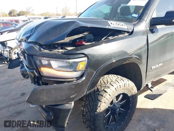 2021 Ram 1500 Laramie with VIN 1C6SRFJT9MN508056, listed as a IAAI auction lot 41223381 with 57,964 mi miles and . Bid and sale history available at DreamBid. Image 6.