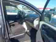 2013 Dodge Grand Caravan SXT with VIN 2C4RDGCG3DR590655, listed as a IAAI auction lot 43391600 with 189,771 mi miles and . Bid and sale history available at DreamBid. Image 5.