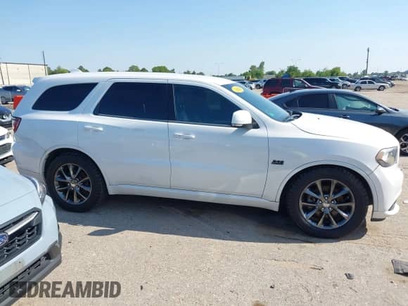 2014 Dodge Durango R/T with VIN 1C4SDHCT6EC332080, listed as a IAAI auction lot 43183223 with 186,190 mi miles and . Bid and sale history available at DreamBid. Image 13.