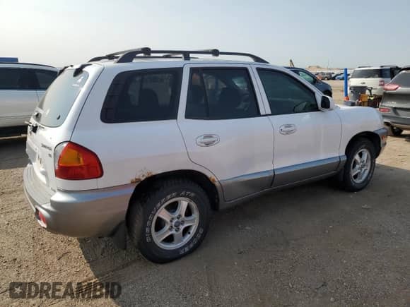 2003 Hyundai Santa Fe GLS с VIN KM8SC73D73U471997, выставлен на аукционе Copart как лот 71192494 с пробегом 102 923 миль миль и Списание • Salvage title. История ставок и продаж доступна на DreamBid. Изображение 3.
