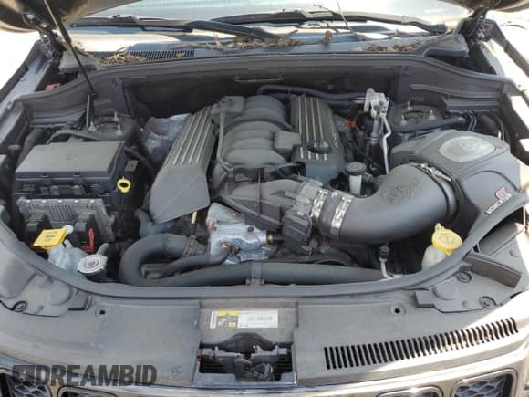 2014 Jeep Grand Cherokee SRT-8 z VIN 1C4RJFDJ0EC171394, wystawiony jako Copart lot #57132295 z przebiegiem 198 657 mil mil oraz Szkoda całkowita • Salvage title. Historia ofert i sprzedaży dostępna na DreamBid. Obrazek 12.