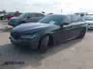 2021 BMW 5 Series 540i with VIN WBA53BJ03MCG98664, listed as a IAAI auction lot 42488708 with 64,101 mi miles and . Bid and sale history available at DreamBid. Image 2.