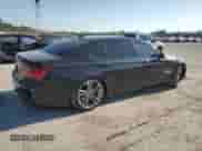 2015 BMW 7 Series 750Li with VIN WBAYE8C51FD781393, listed as a Copart auction lot 69856865 with 105,251 mi miles and Salvage title. Bid and sale history available at DreamBid. Image 3.