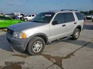 2003 Ford Explorer XLS with VIN 1FMZU62K43ZB15869, listed as a Copart auction lot 64329445 with 77,000 mi miles and Salvage title. Bid and sale history available at DreamBid. Image 1.