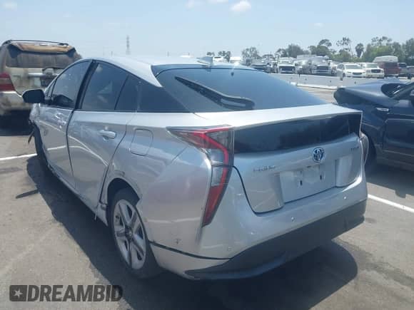 2017 Toyota Prius Two z VIN JTDKARFU0H3042988, wystawiony jako IAAI lot #42580166 z przebiegiem 169 300 mil mil oraz . Historia ofert i sprzedaży dostępna na DreamBid. Obrazek 3.