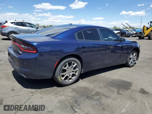 2015 Dodge Charger SE with VIN 2C3CDXFG3FH815378, listed as a Copart auction lot 57861125 with 135,452 mi miles and Salvage title. Bid and sale history available at DreamBid. Image 3.