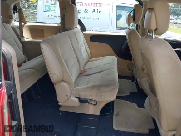 2014 Dodge Grand Caravan SE with VIN 2C4RDGBG5ER312293, listed as a IAAI auction lot 42592012 with 148,200 mi miles and . Bid and sale history available at DreamBid. Image 8.