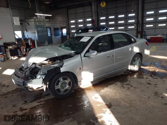2004 Saturn L L300 1 with VIN 1G8JC54F34Y515972, listed as a IAAI auction lot 41295581 with Not provided miles and . Bid and sale history available at DreamBid. Image 2.