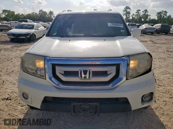 2011 Honda Pilot Touring с VIN 5FNYF3H98BB029742, выставлен на аукционе Copart как лот 70890845 с пробегом 222 211 миль миль и Списание • Salvage title. История ставок и продаж доступна на DreamBid. Изображение 5.