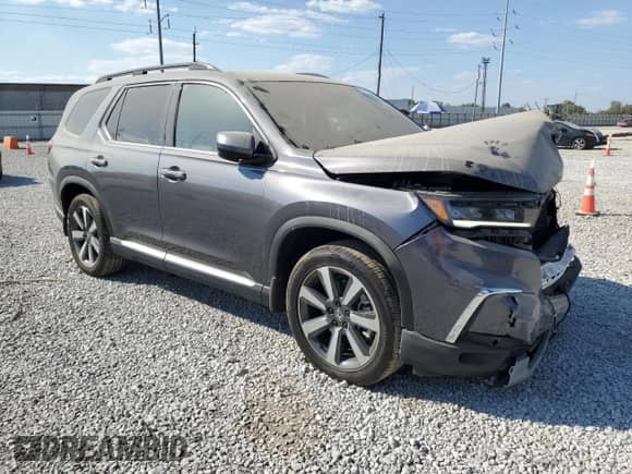 2025 Honda Pilot Touring с VIN 5FNYG1H79SB089318, выставлен на аукционе Copart как лот 80371655 с пробегом 19 357 миль миль и Списание • Salvage title. История ставок и продаж доступна на DreamBid. Изображение 4.