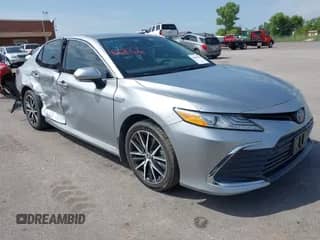 2021 Toyota Camry Hybrid XLE with VIN 4T1F31AK5MU565376, listed as a IAAI auction lot 42687616 with 57,880 mi miles and . Bid and sale history available at DreamBid. Image 1.