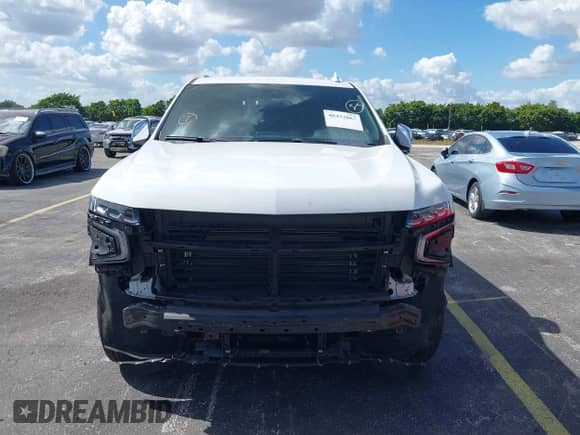 2023 Chevrolet Suburban Premier with VIN 1GNSCFKD9PR387180, listed as a IAAI auction lot 40433867 with 40,936 mi miles and . Bid and sale history available at DreamBid. Image 13.