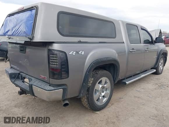 2009 GMC Sierra 1500 SLT with VIN 3GTEK33M99G116385, listed as a IAAI auction lot 41370587 with 178,679 mi miles and . Bid and sale history available at DreamBid. Image 4.