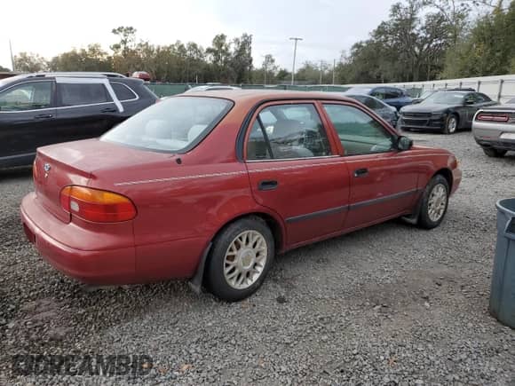 2001 Chevrolet Prizm с VIN 1Y1SK52881Z418012, выставлен на аукционе Copart как лот 84402984 с пробегом Не указан миль и Списание • Salvage title. История ставок и продаж доступна на DreamBid. Изображение 3.