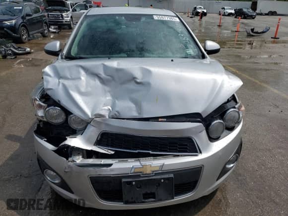2013 Chevrolet Sonic LTZ с VIN 1G1JE5SG5D4217581, выставлен на аукционе Copart как лот 55977985 с пробегом 49 601 миль миль и Списание • Salvage title. История ставок и продаж доступна на DreamBid. Изображение 5.