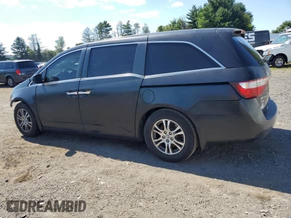2013 Honda Odyssey EX с VIN 5FNRL5H41DB001667, выставлен на аукционе Copart как лот 70164215 с пробегом 260 658 миль миль и Списание • Salvage title. История ставок и продаж доступна на DreamBid. Изображение 2.