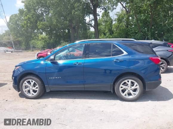 2021 Chevrolet Equinox Premier z VIN 2GNAXXEV4M6148508, wystawiony jako IAAI lot #42929506 z przebiegiem 59 861 mil mil oraz . Historia ofert i sprzedaży dostępna na DreamBid. Obrazek 14.
