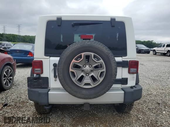 2012 Jeep Wrangler Sahara z VIN 1C4AJWBG5CL134097, wystawiony jako Copart lot #58729075 z przebiegiem 191 504 mil mil oraz Czysty tytuł • Clean title. Historia ofert i sprzedaży dostępna na DreamBid. Obrazek 6.