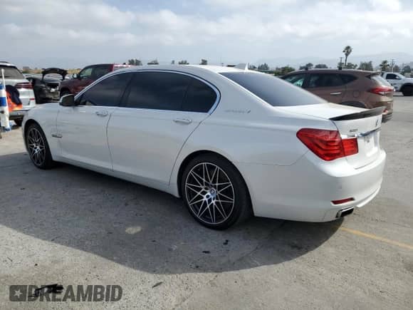 2011 BMW 7 Series с VIN WBAKX8C59BC198053, выставлен на аукционе Copart как лот 61238865 с пробегом 97 274 миль миль и Чистый • Clean title. История ставок и продаж доступна на DreamBid. Изображение 2.