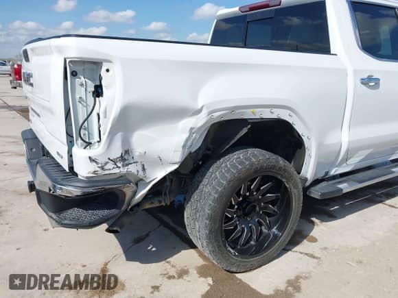 2019 GMC Sierra 1500 SLT z VIN 3GTP8DED8KG274135, wystawiony jako IAAI lot #43219885 z przebiegiem 70 501 mil mil oraz . Historia ofert i sprzedaży dostępna na DreamBid. Obrazek 6.