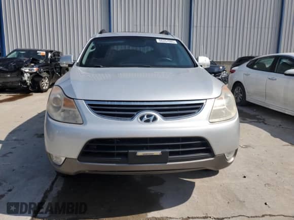 2012 Hyundai Veracruz Limited с VIN KM8NU4CC4CU190854, выставлен на аукционе Copart как лот 66267085 с пробегом 123 955 миль миль и Списание • Salvage title. История ставок и продаж доступна на DreamBid. Изображение 5.