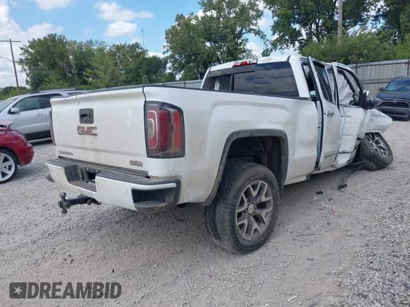 2016 GMC Sierra 1500 SLT with VIN 1GTV2NEC6GZ418892, listed as a IAAI auction lot 43055638 with Not provided miles and . Bid and sale history available at DreamBid. Image 4.