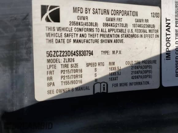 2004 Saturn VUE z VIN 5GZCZ23D64S830794, wystawiony jako Copart lot #67959235 z przebiegiem 308 894 mil mil oraz Szkoda całkowita • Salvage title. Historia ofert i sprzedaży dostępna na DreamBid. Obrazek 13.