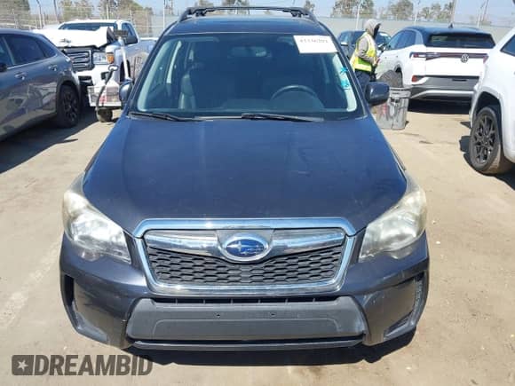 2014 Subaru Forester XT Premium with VIN JF2SJGDC0EH520728, listed as a IAAI auction lot 43336202 with 165,577 mi miles and . Bid and sale history available at DreamBid. Image 6.