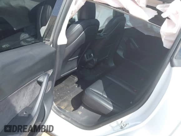 2022 Tesla Model Y Long Range z VIN 7SAYGDEE2NF385910, wystawiony jako IAAI lot #42146793 z przebiegiem 67 604 mil mil oraz . Historia ofert i sprzedaży dostępna na DreamBid. Obrazek 8.