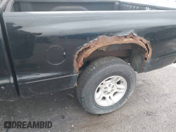 2001 Dodge Dakota Sport z VIN 1B7GG22N81S212519, wystawiony jako IAAI lot #43557080 z przebiegiem 150 028 mil mil oraz . Historia ofert i sprzedaży dostępna na DreamBid. Obrazek 6.