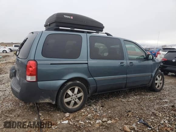 2007 Saturn Relay 3 with VIN 5GZDV231X7D153134, listed as a Copart auction lot 86535584 with 188,077 mi miles and Salvage title. Bid and sale history available at DreamBid. Image 3.