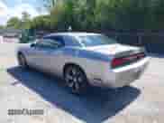 2013 Dodge Challenger SXT z VIN 2C3CDYAG6DH680794, wystawiony jako IAAI lot #43140092 z przebiegiem 162 518 mil mil oraz . Historia ofert i sprzedaży dostępna na DreamBid. Obrazek 3.