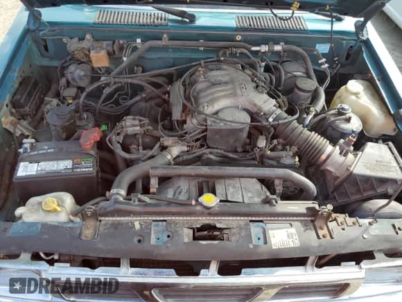 1995 Nissan Frontier XE with VIN 1N6HD16S3SC463075, listed as a Copart auction lot 76235934 with 122,466 mi miles and Salvage title. Bid and sale history available at DreamBid. Image 11.