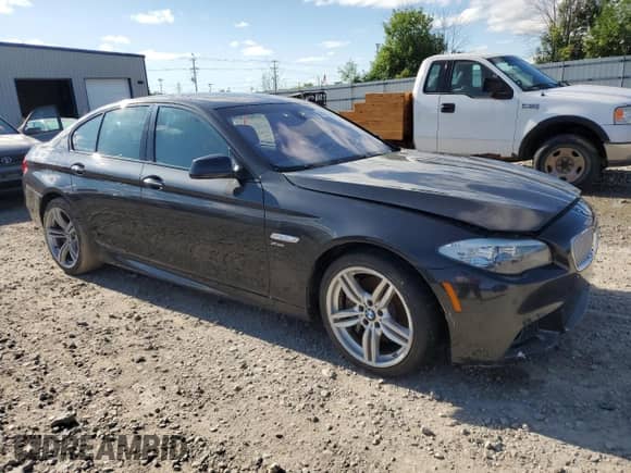 2011 BMW 5 Series 550i xDrive with VIN WBAFU9C54BC786443, listed as a Copart auction lot 65269705 with Not provided miles and Clean title. Bid and sale history available at DreamBid. Image 4.