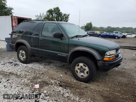 2002 Chevrolet Blazer LS с VIN 1GNCT18W92K128951, выставлен на аукционе Copart как лот 69324585 с пробегом 69 957 миль миль и Чистый • Clean title. История ставок и продаж доступна на DreamBid. Изображение 4.