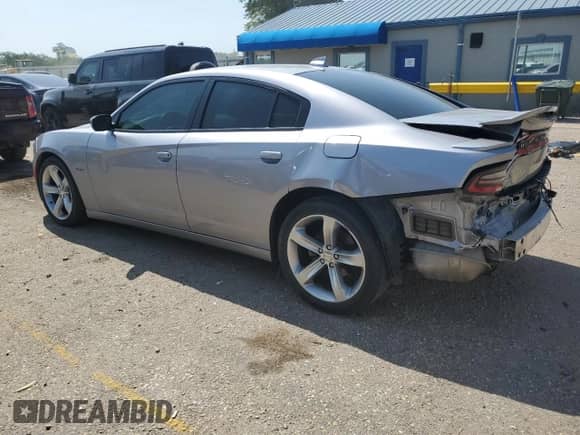 2016 Dodge Charger R/T with VIN 2C3CDXCT8GH346730, listed as a Copart auction lot 65763195 with 103,253 mi miles and Salvage title. Bid and sale history available at DreamBid. Image 2.
