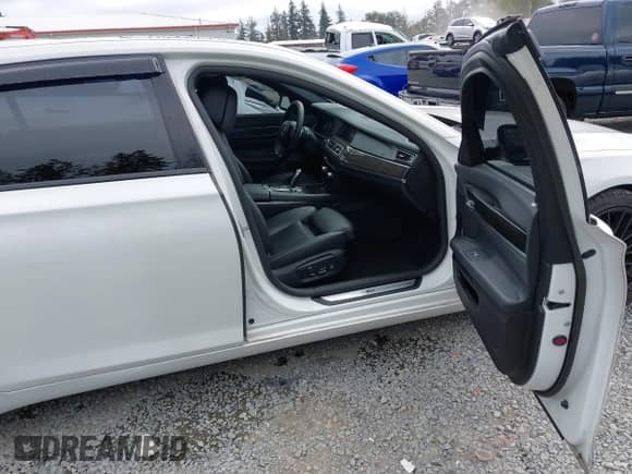 2013 BMW 7 Series 740Li with VIN WBAYE4C57DD136902, listed as a IAAI auction lot 43210485 with 70,724 mi miles and . Bid and sale history available at DreamBid. Image 5.