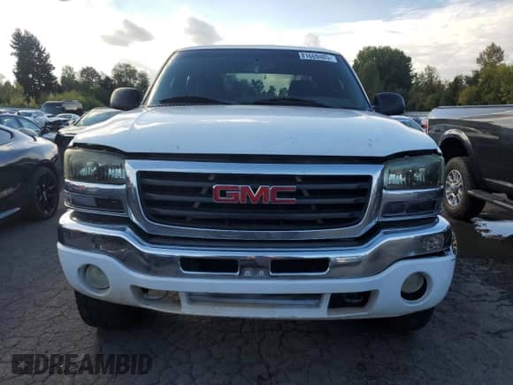 2003 GMC Sierra 1500 SLT z VIN 2GTEK19T731335445, wystawiony jako Copart lot #81689485 z przebiegiem Nie podano mil oraz Szkoda całkowita • Salvage title. Historia ofert i sprzedaży dostępna na DreamBid. Obrazek 5.