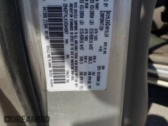 2001 Dodge Caravan EX z VIN 2B4GP74LX1R344947, wystawiony jako Copart lot #50308655 z przebiegiem 132 321 mil mil oraz Szkoda całkowita • Salvage title. Historia ofert i sprzedaży dostępna na DreamBid. Obrazek 15.