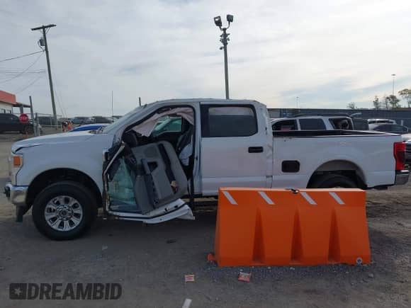 2022 Ford F-250 XL with VIN 1FT7W2BT3NEF14970, listed as a IAAI auction lot 43517087 with 34,043 mi miles and . Bid and sale history available at DreamBid. Image 14.