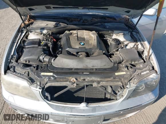 2007 BMW 7 Series 750Li z VIN WBAHN83567DT68273, wystawiony jako IAAI lot #43423449 z przebiegiem Nie podano mil oraz . Historia ofert i sprzedaży dostępna na DreamBid. Obrazek 10.