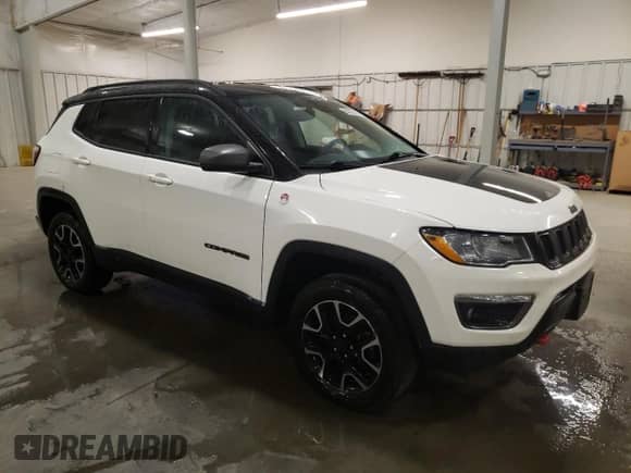 2019 Jeep Compass Trailhawk с VIN 3C4NJDDB5KT733558, выставлен на аукционе Copart как лот 86252424 с пробегом 113 977 миль миль и Списание • Salvage title. История ставок и продаж доступна на DreamBid. Изображение 4.
