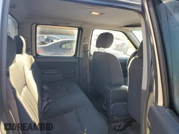 2002 Nissan Frontier SVE with VIN 1N6MD27Y22C389865, listed as a Copart auction lot 89300285 with 196,212 mi miles and Salvage title. Bid and sale history available at DreamBid. Image 10.