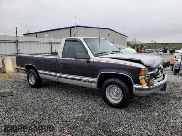 1997 Chevrolet Silverado 1500 with VIN 1GCEC14R2VZ231710, listed as a Copart auction lot 51452965 with 263,678 mi miles and Salvage title. Bid and sale history available at DreamBid. Image 4.