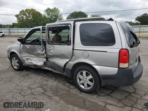 2005 Saturn Relay 3 with VIN 5GZDV23L25D207587, listed as a Copart auction lot 67914704 with 139,803 mi miles and Salvage title. Bid and sale history available at DreamBid. Image 2.