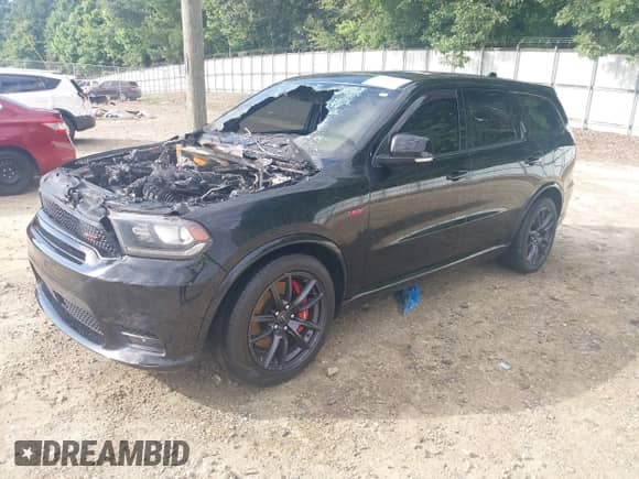 2018 Dodge Durango SRT with VIN 1C4SDJGJXJC213653, listed as a IAAI auction lot 42765062 with Not provided miles and . Bid and sale history available at DreamBid. Image 2.