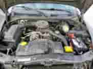 2001 Dodge Dakota z VIN 1B7GL22X91S341785, wystawiony jako Copart lot #90262095 z przebiegiem 164 468 mil mil oraz Szkoda całkowita • Salvage title. Historia ofert i sprzedaży dostępna na DreamBid. Obrazek 11.