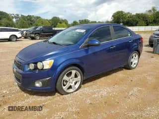 2014 Chevrolet Sonic LTZ с VIN 1G1JE5SB6E4216459, выставлен на аукционе Copart как лот 82163015 с пробегом 122 912 миль миль и Чистый • Clean title. История ставок и продаж доступна на DreamBid. Изображение 1.